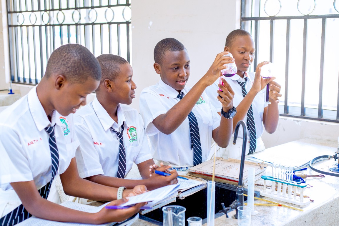 Musabe Girls Taking Experiment